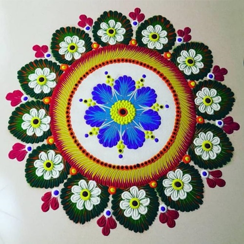 Simple Rangoli Designs with centre of blue flower